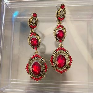 Red and gold dangle earrings Pierced long
